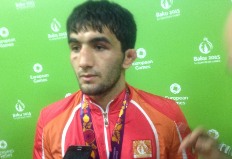 Azerbaijani wrestler wins Armenian rival for Baku 2015 bronze