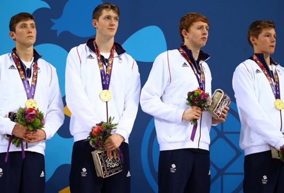 Britain pip Russia on first night of swimming action