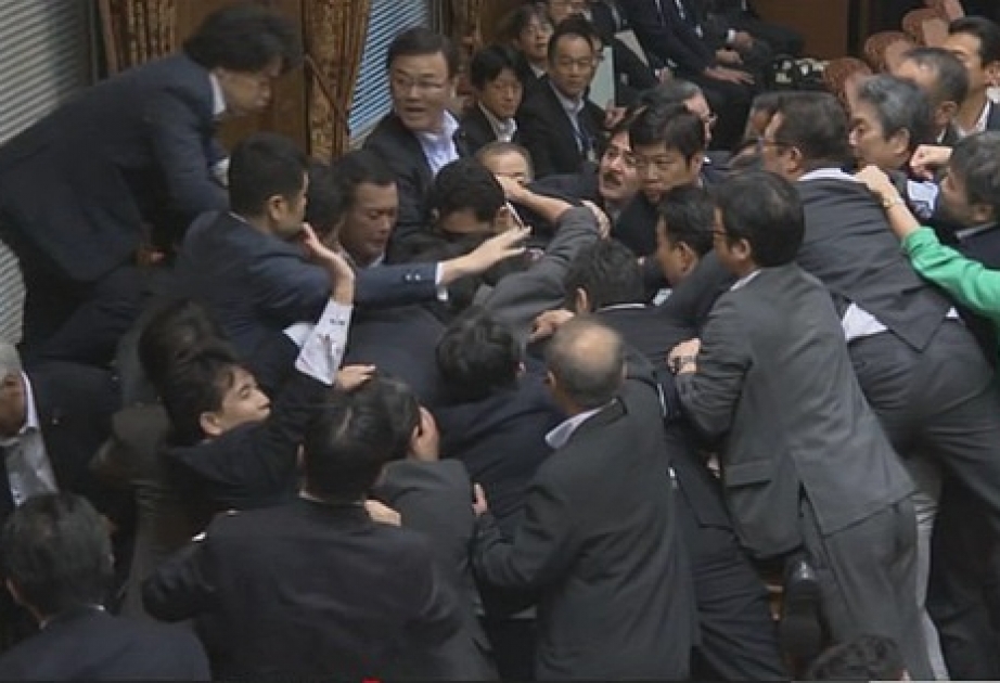 Japan's controversial security bills clear upper house panel