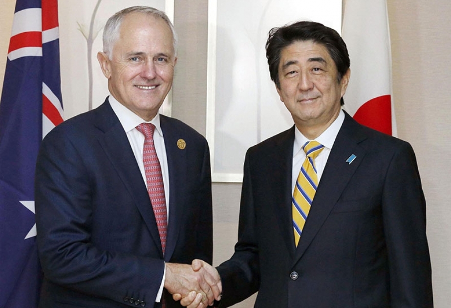 Japan, Australia vow to boost defense cooperation