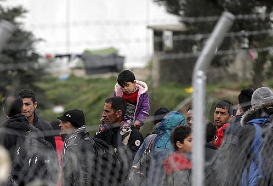 EU leaders dismiss Greek threat to block summit deals over migrant crisis