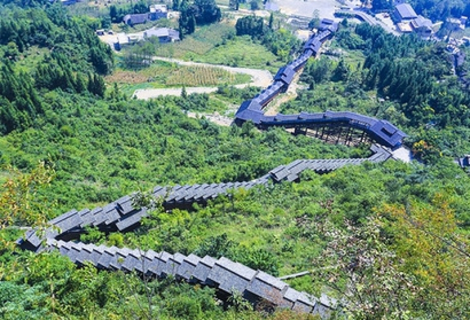 World's longest sightseeing escalator takes tourists for a ride in China