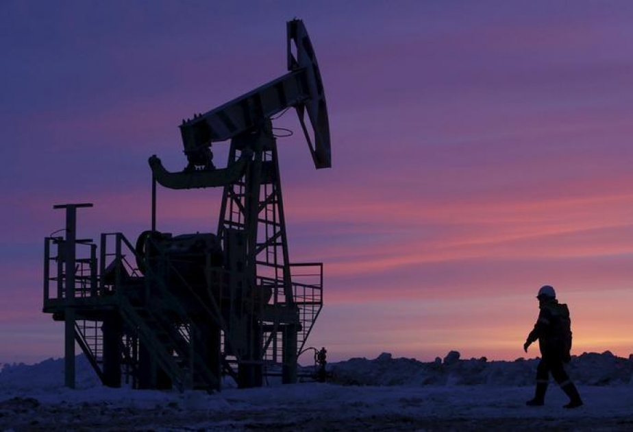 Oil prices keep a grip on rally after OPEC deal; Brent atop $52 a barrel