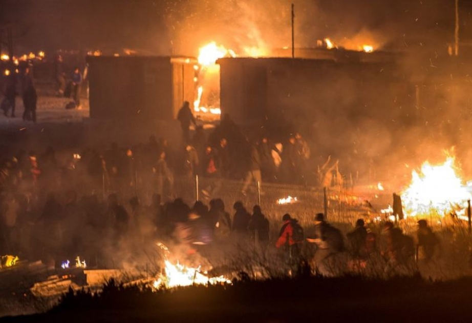 Fransada miqrant düşərgəsində baş verən yanğında azı 10 nəfər yaralanıb VİDEO