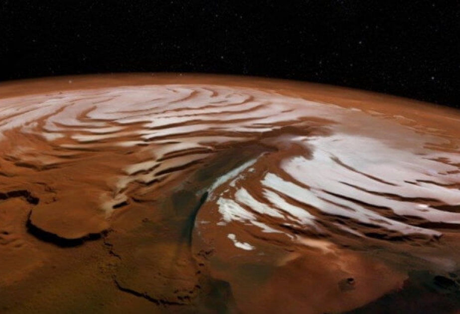 Под поверхностью северного полюса Марса обнаружены огромные запасы водного льда