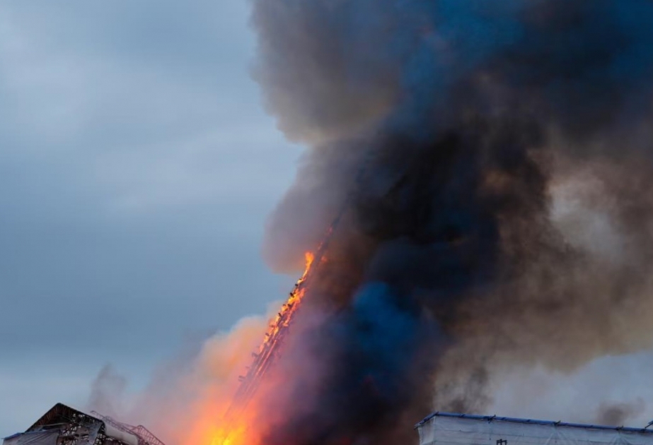 Copenhagen fire: Spire collapses as historic stock exchange engulfed by flames