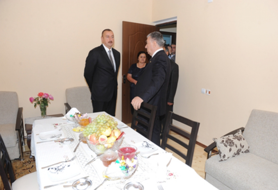 La président M. Ilham Aliyev a participé à la cérémonie d’ouverture du nouveau bourg construit à Chéki pour 423 familles déplacées
