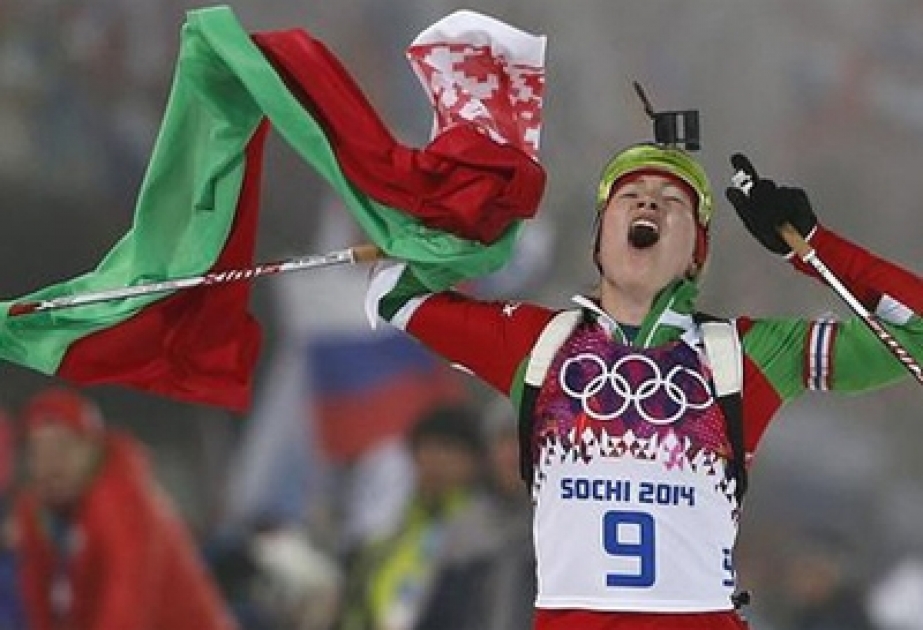 Domracheva wins third biathlon gold at Sochi 2014