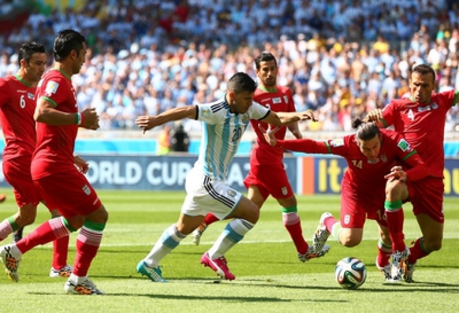 Messi magic takes Argentina through