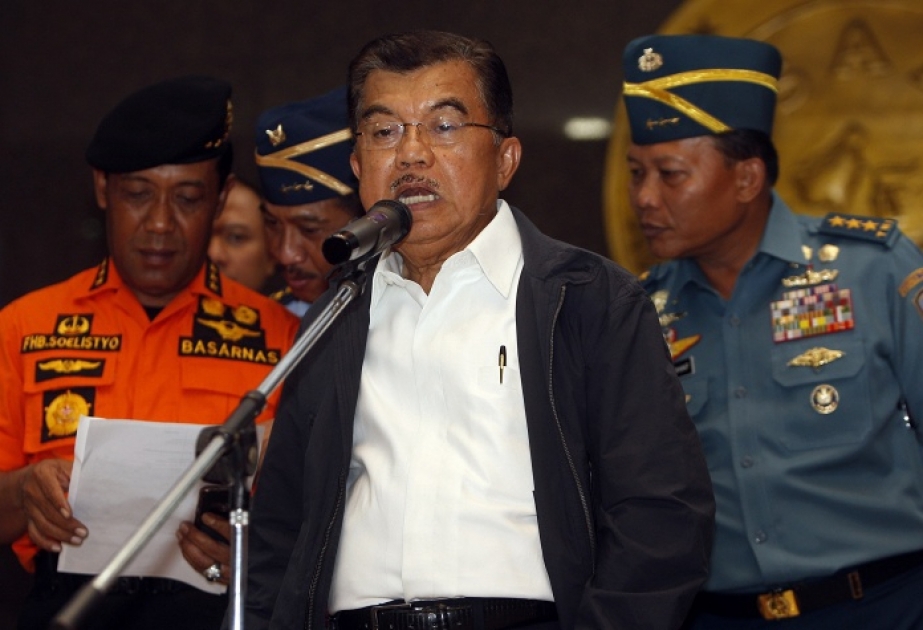 Search for Air Asia plane suspended for the night