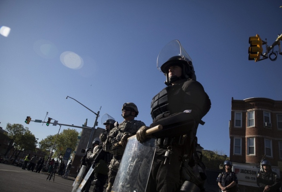 Baltimore riots: Troops deployed as cleanup begins