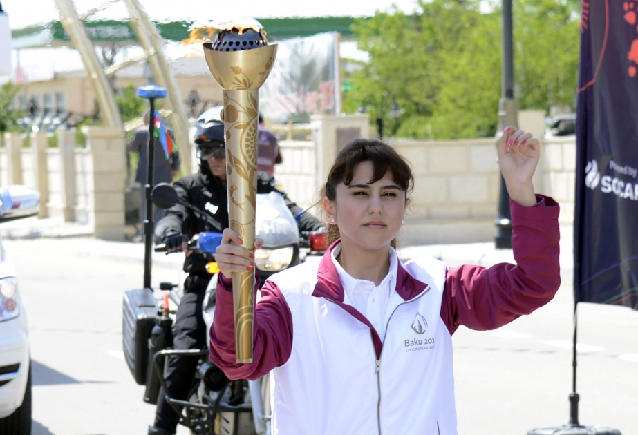 Bilasuvar is the next stop on the journey of Baku 2015 flame VIDEO
