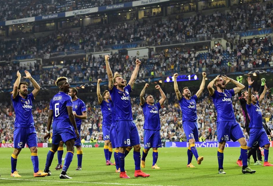 Morata takes Juve through at Madrid's expense