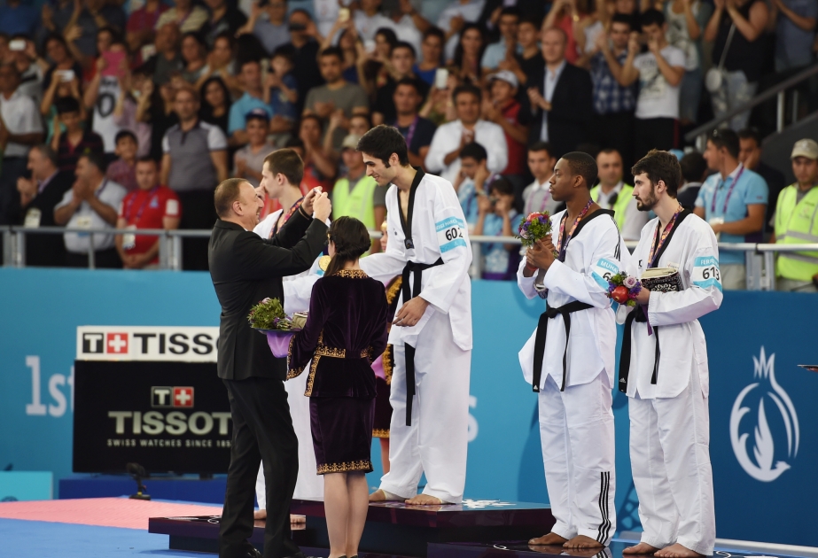 Azerbaijan won the 12th gold at the First European Games  President Ilham Aliyev presented the gold medal to the champion VIDEO
