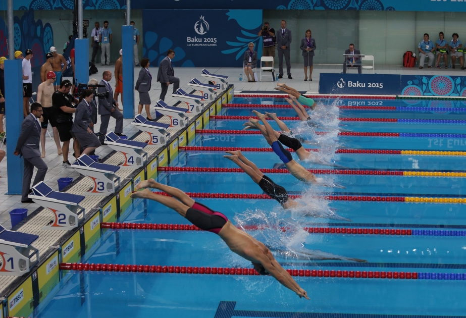 Record-breaking Astashkina wins triple gold in pool
