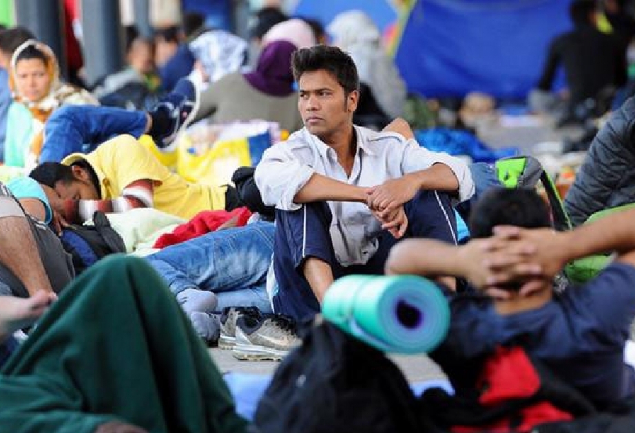 David Cameron says UK will take thousands more Syrian refugees