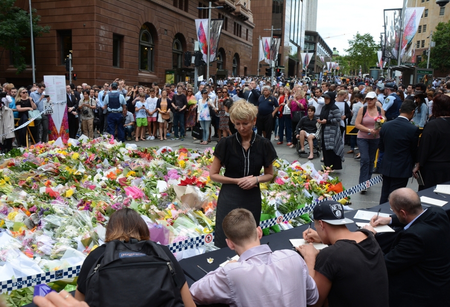 Sydney siege anniversary: nation stops to honour victims one year on from Martin Place attack