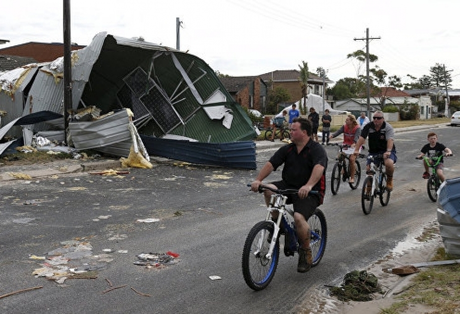 Tornado rips roofs off homes as record winds lash Sydney