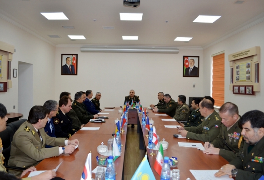 Foreign military attaches visit International Military Cooperation Department