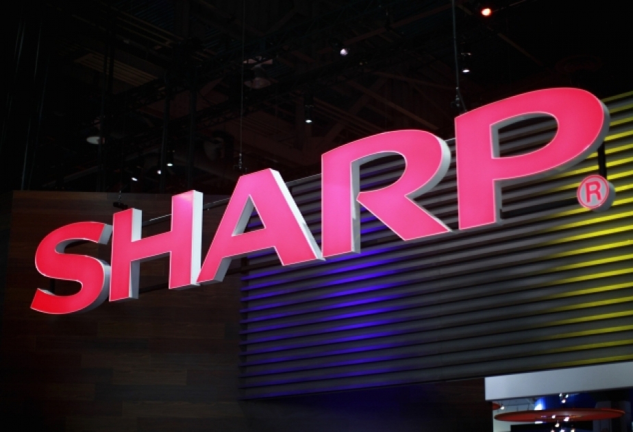 Foxconn agrees to buy Sharp
