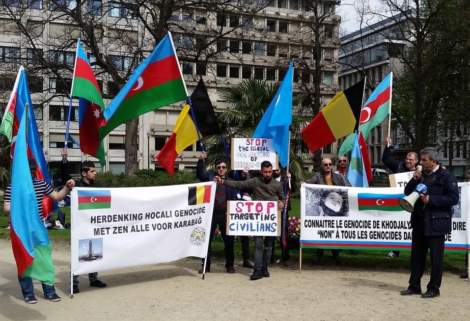 More than 40 Belgian riot police hold back Armenians in Brussels