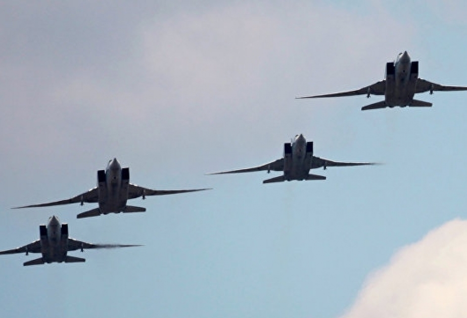 Six Russian Tu-22M3 backfire long-range bombers deliver strikes on IS facilities in Syria