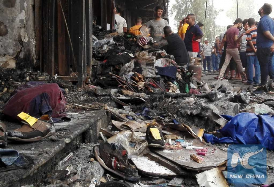 At least 40 people killed in Isis suicide attack on crowded market in Baghdad during Shia festival