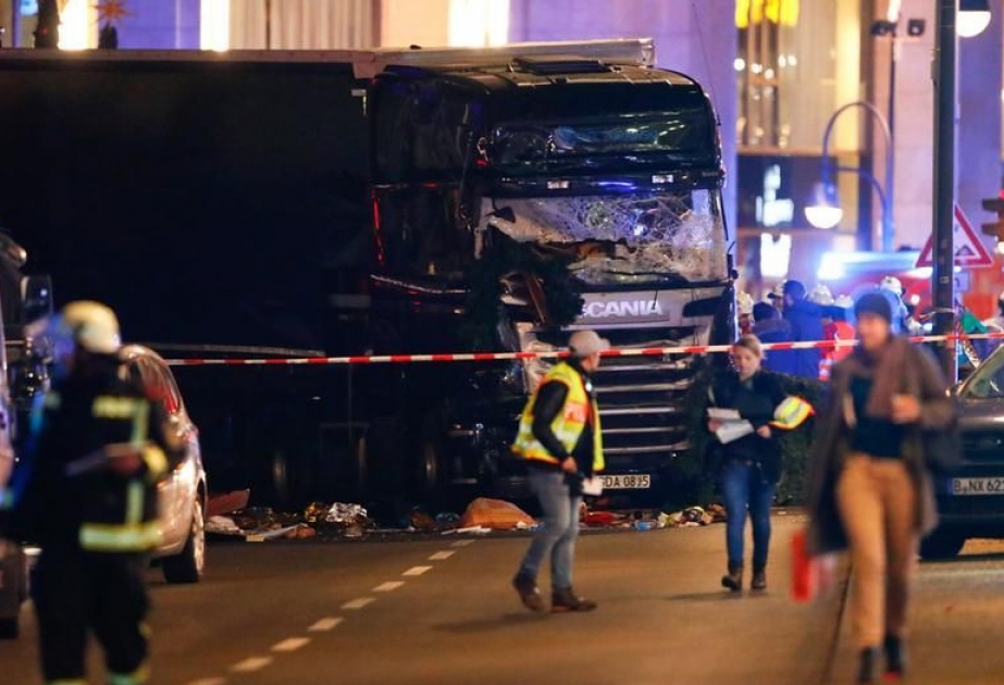 Truck ploughs into crowd at Berlin Christmas market, 12 dead