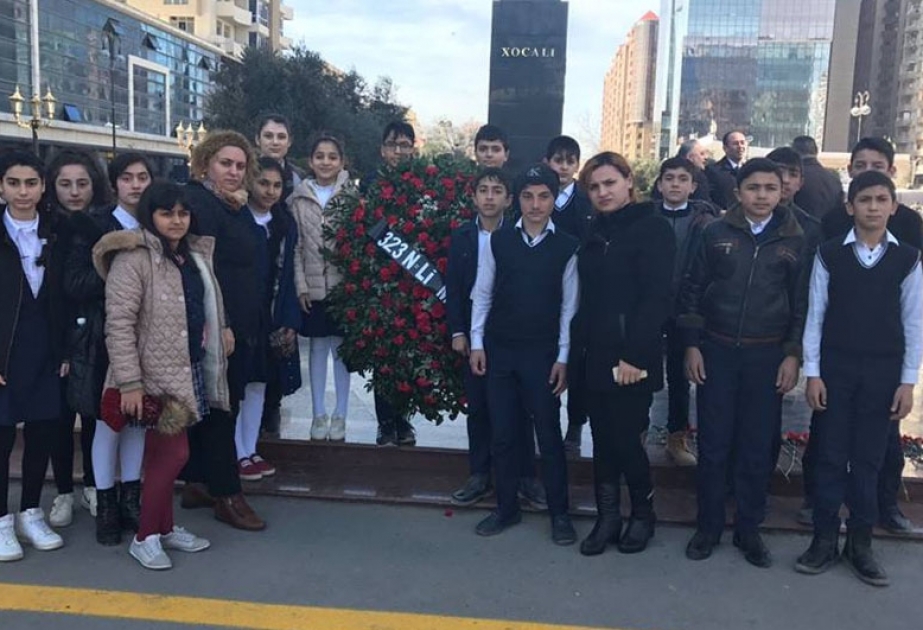 Məktəblilər Xocalıda qətlə yetirilən həmyaşıdlarını yad ediblər