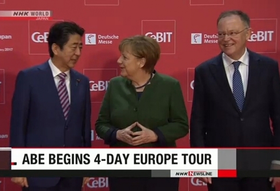 Japan’s Abe and Germany’s Merkel talk up free trade, urge ‘sluggish’ EU to sign key deal
