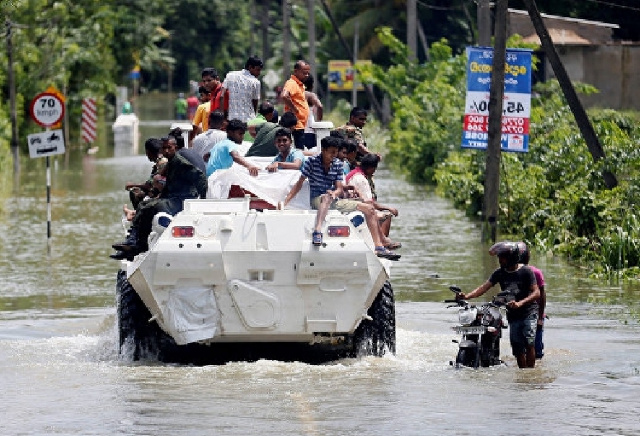 Sri Lanka races to rescue flood victims before rain resumes