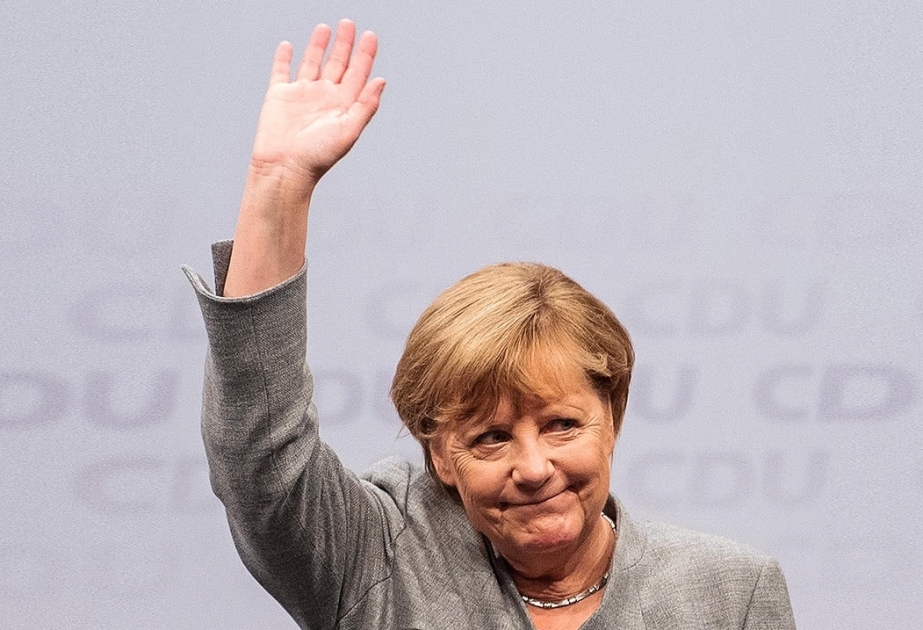 Merkel bloc wins election but faces far-right challenge