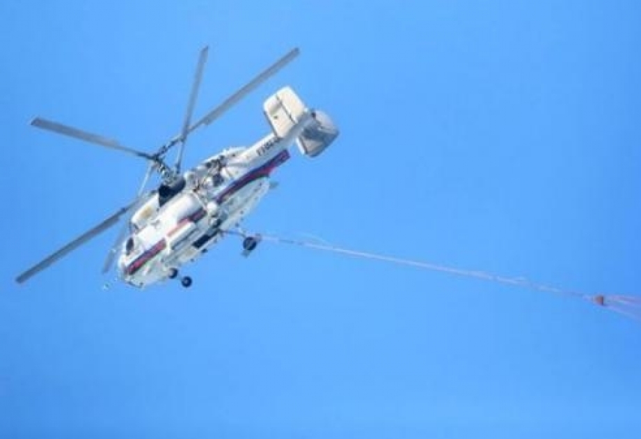 Azərbaycandan göndərilmiş helikopter Gürcüstanın Borjomi bölgəsində yanğının söndürülməsində fəal iştirak edir