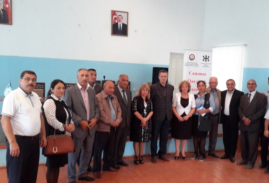 Bir qrup yazıçı Biləsuvarda məcburi köçkünlərlə görüşüb