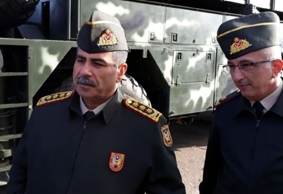 Azerbaijan's Defense Minister views military equipment produced by Belarusian defense industry