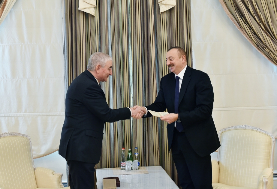 Chairman of Central Election Commission Mazahir Panahov presented presidential candidate certificate to Ilham Aliyev VIDEO