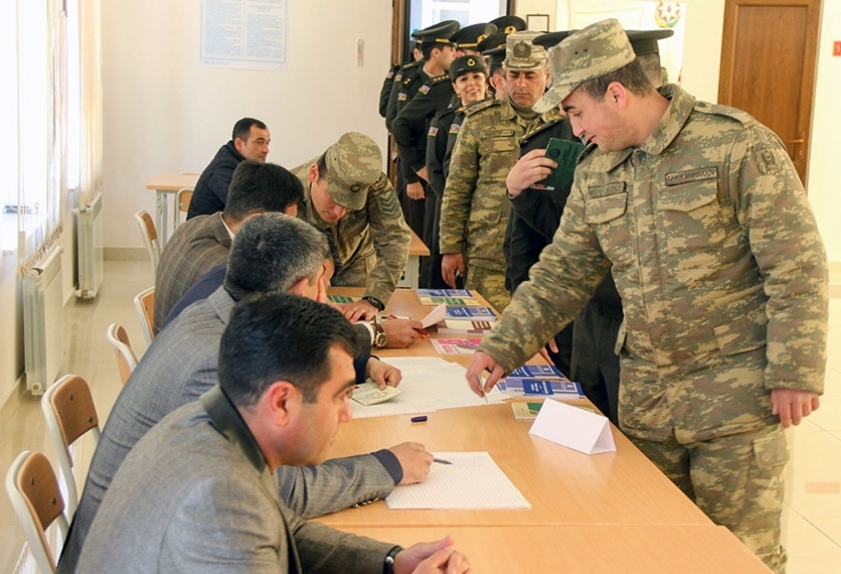 Azerbaijan Army military personnel participate in voting for presidential elections