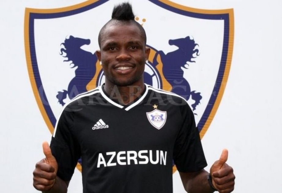 Donald Guerrier signs his contract extension with Qarabag