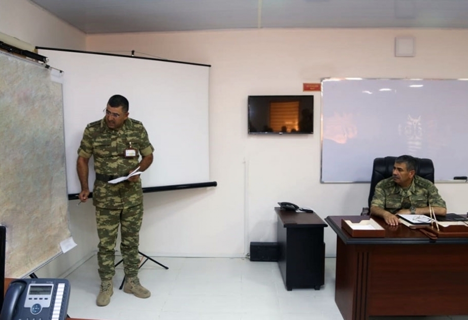 Defense minister holds meeting in field conditions