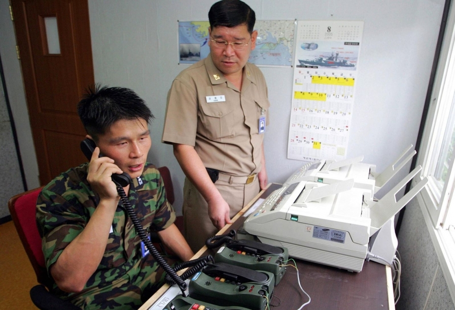 Two Koreas fully restore western military communication line