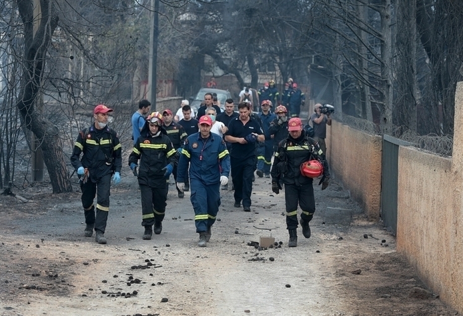 Death toll in wildfires near Athens rises to 74