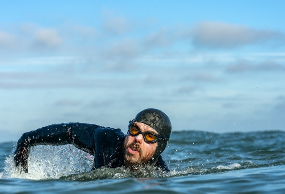 After 5 months at sea, Ross Edgley completes swim around Great Britain