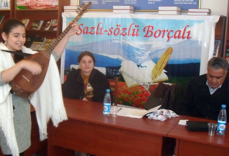 Sazın-sözün zirvəsində dayanan şair