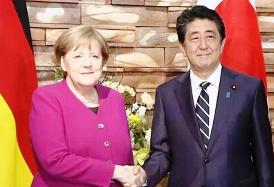 Abe, Merkel agree to bolster economic ties