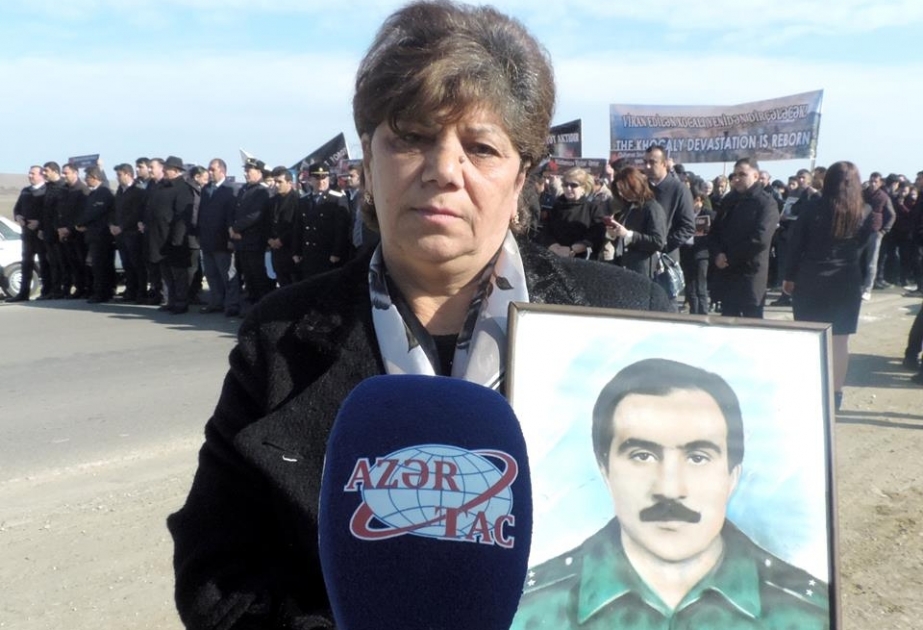 Erməni əsirliyində olan Xocalı sakini: Qızımı boynumdakı şərflə boğmaq istəyəndə, yalvardı ki, onu öldürməyim...