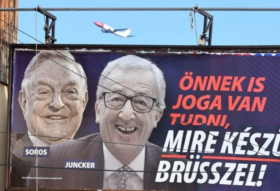 Macarıstanda Soros və Yunkerin portretlərini uşaq artımı plakatları əvəz edəcək