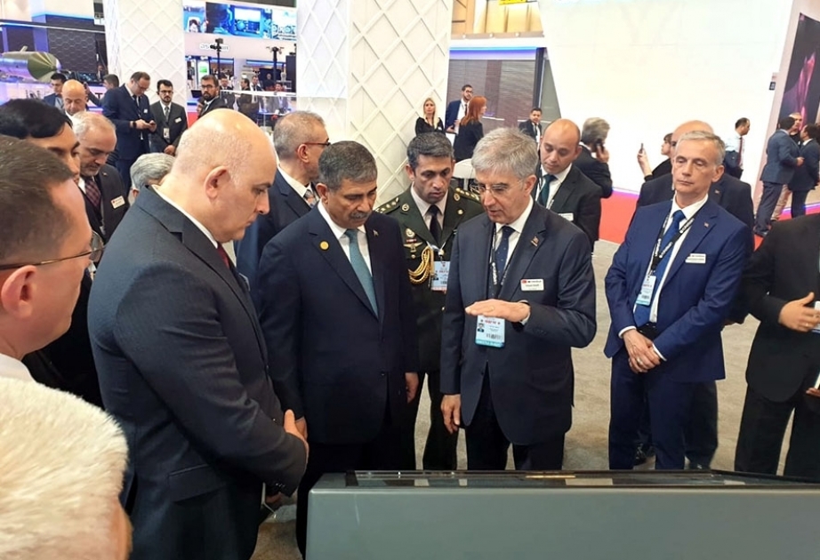 Azerbaijan`s defense minister views products of various companies demonstrated at IDEF’19