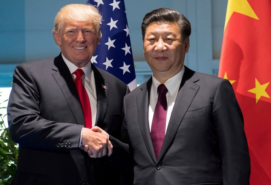 Si Cinpin Donald Trampı KXDR-ə qarşı sanksiyaları yumşaltmağa çağırıb