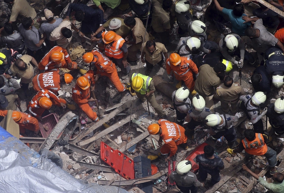 2 killed, 40 trapped in India building collapse