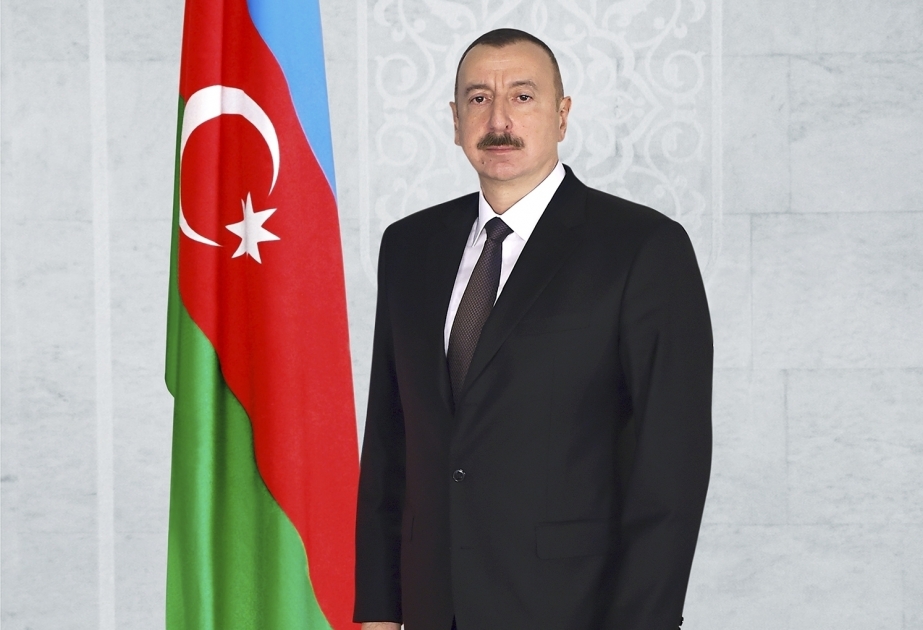 President Ilham Aliyev awards group of people engaged in work with youth and sports
